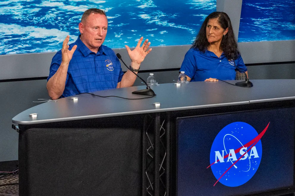 The two NASA astronauts respond to questions during a media briefing after the pair is identified to be the first crew to fly the Boeing CFT-100 Starliner spacecraft, in March 2024 | Source: Getty Images