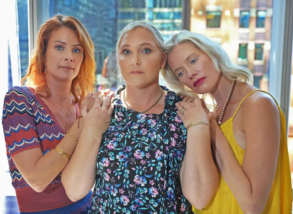 Victims of Jeffrey Epstein, from left, Sarah Ransome, Virginia Roberts Giuffre, and Marijke Chartouni pose after meeting at an emotional court hearing for victims of Epstein on August 27, 2019. | Source: Getty Images